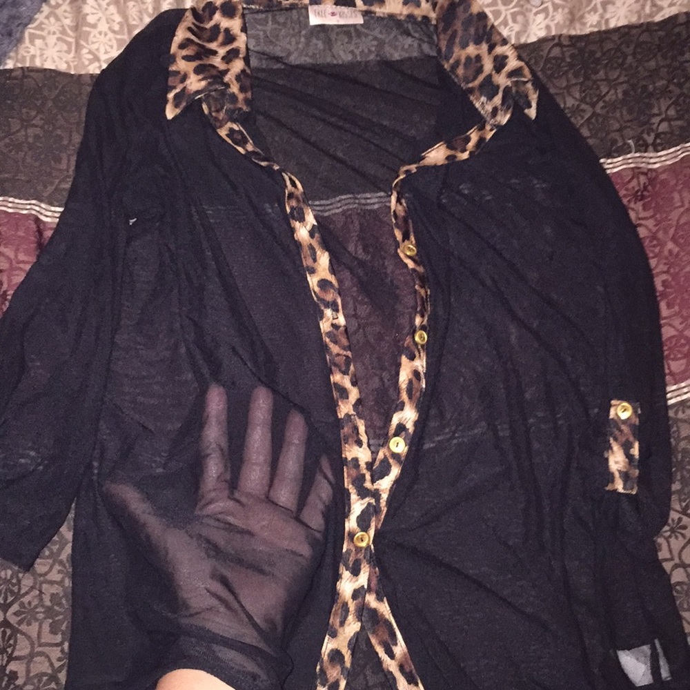 Beautiful see-through blouse outlined in cheetah